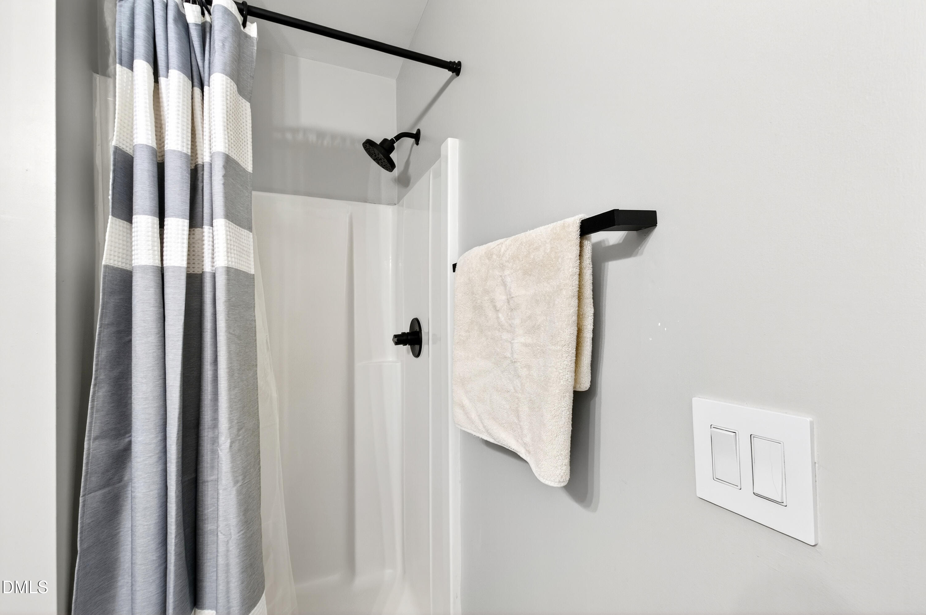 37 Red Lane Raleigh, NC 27606 - Photo 16 of 32 a bathroom with a shower and a door