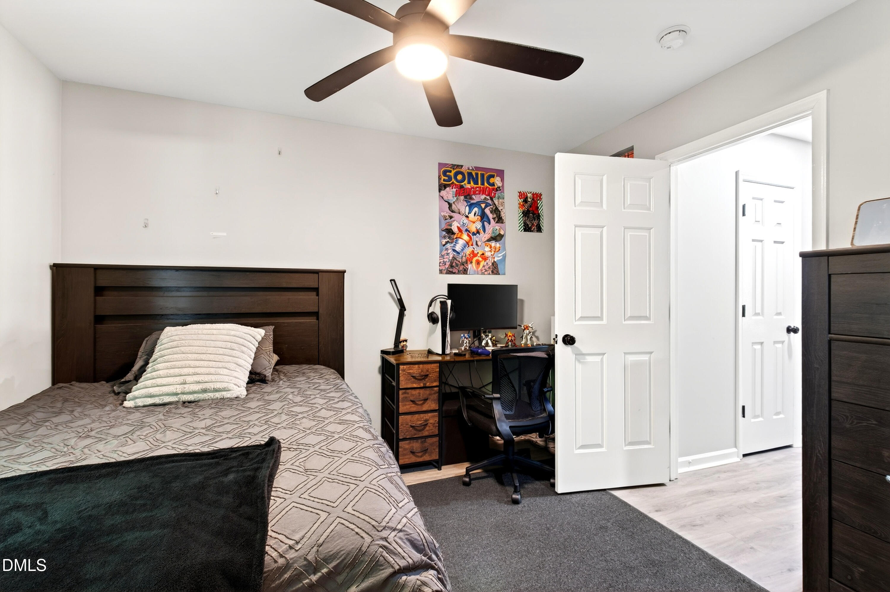 37 Red Lane Raleigh, NC 27606 - Photo 22 of 32 a bedroom with furniture and a fireplace