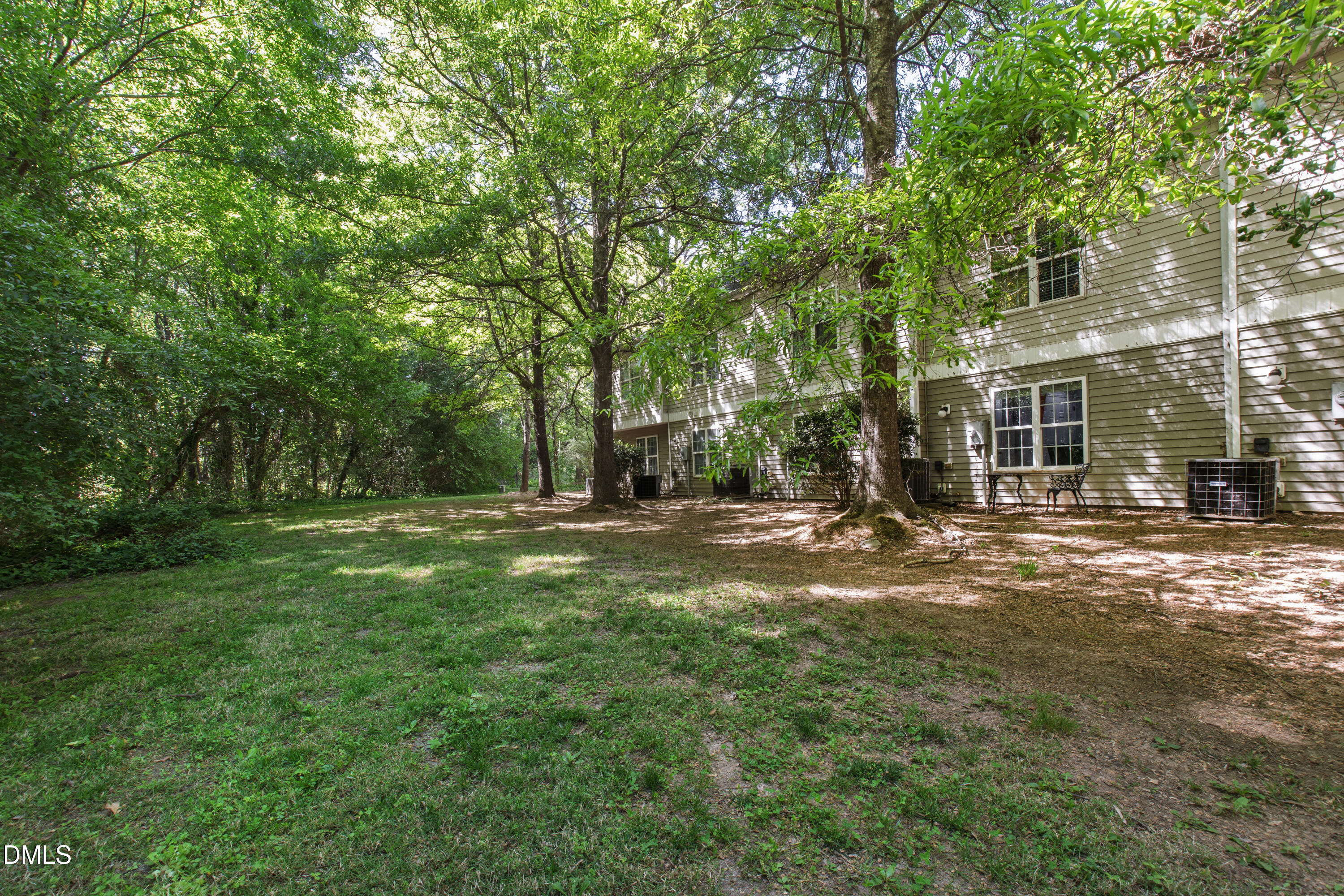 37 Red Lane Raleigh, NC 27606 - Photo 29 of 32 a backyard of a house with lots of green space