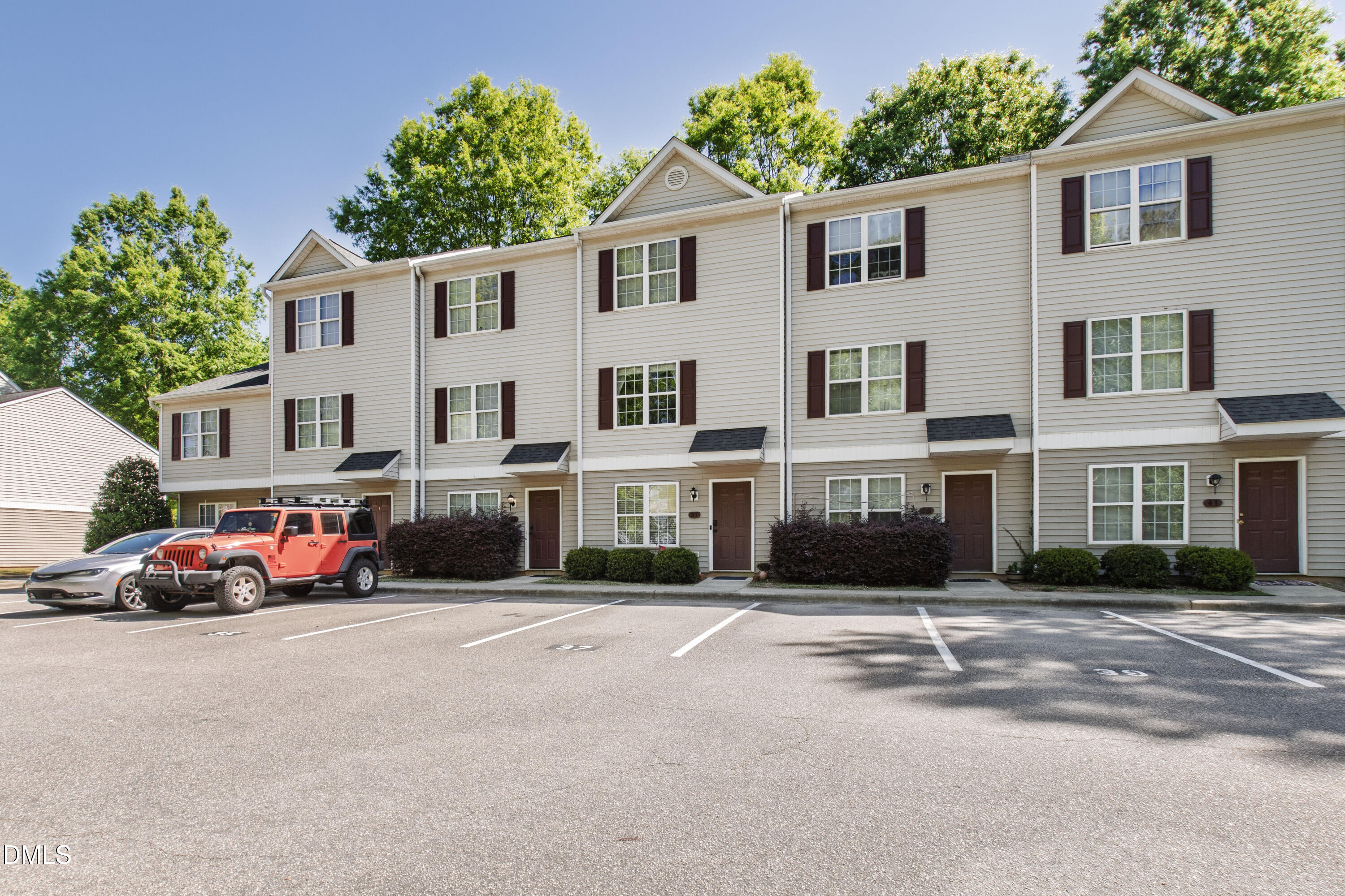 37 Red Lane Raleigh, NC 27606 - Photo 31 of 32 a front view of residential houses with yard