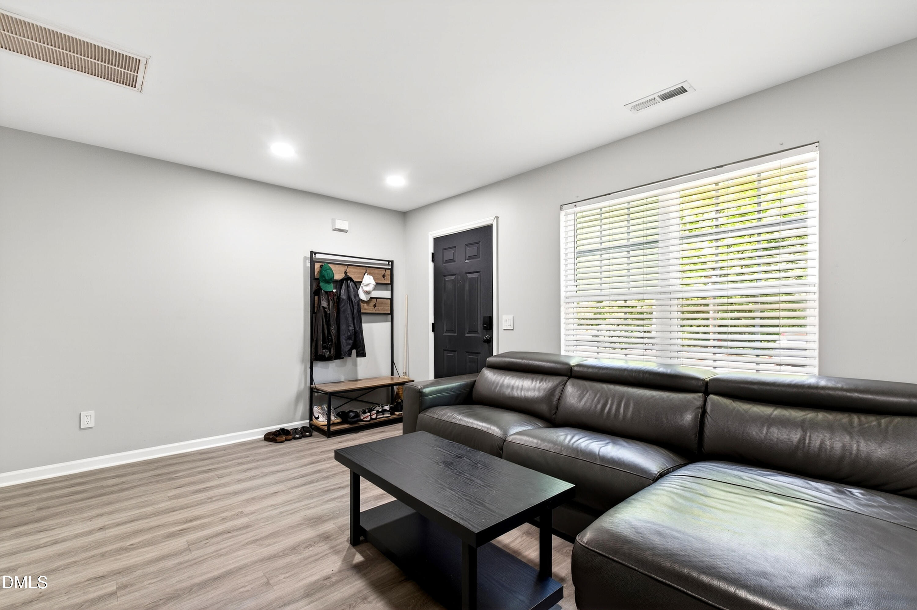 37 Red Lane Raleigh, NC 27606 - Photo 3 of 32 a living room with furniture and wooden floor
