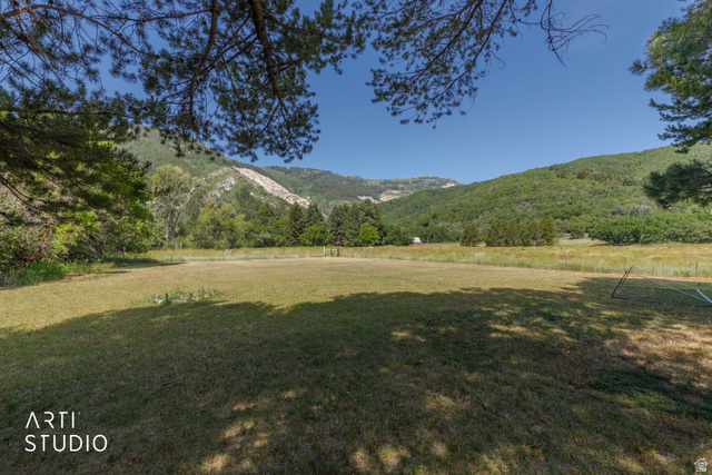 2807 North Ogden Canyon Road Eden, UT 84310 - Photo 50 of 72 Expansive grassy area with distant mountains and abundant trees
