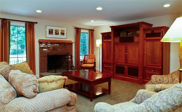 87 Winslow Road Newton, MA 02468 - Photo 4 of 9 a living room with furniture a fireplace and a large window