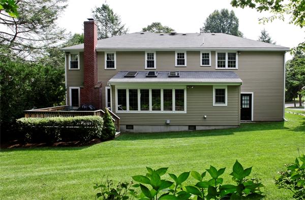 87 Winslow Road Newton, MA 02468 - Photo 8 of 9 a view of a house with a garden