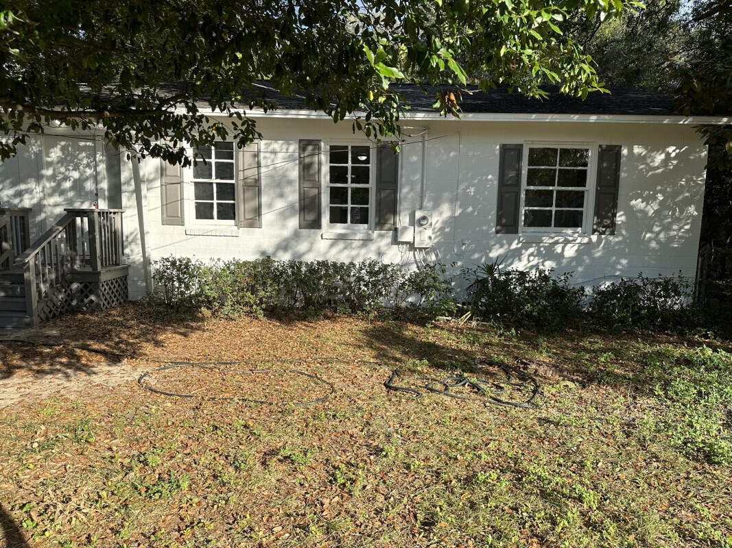 324 Dixie Street Crestview, FL 32536 - Photo 2 of 8 front view of a house with a yard