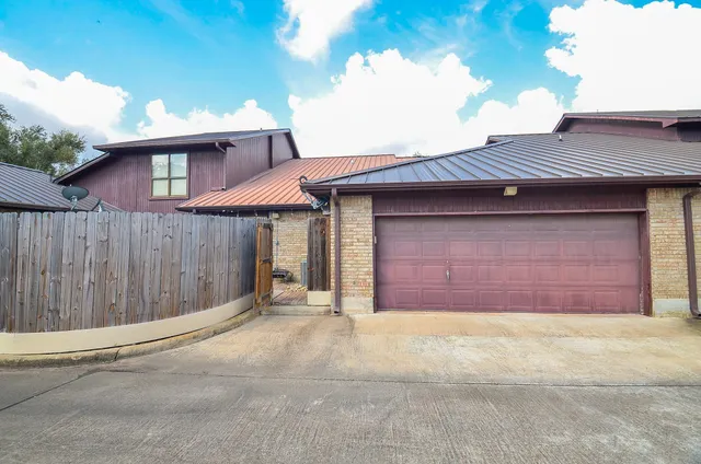 a view of a backyard of the house