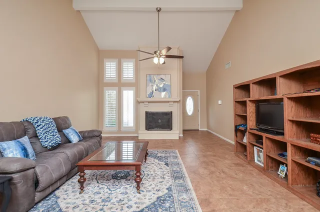 a view of a hallway with chairs