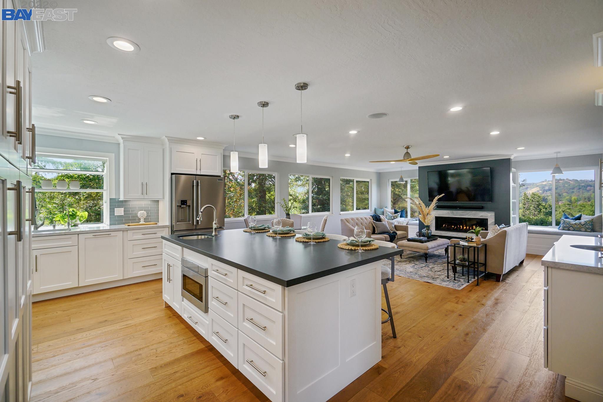 14 Pillon Real Pleasant Hill, CA 94523 - Photo 1 of 1 a kitchen with stainless steel appliances granite countertop a sink and a stove