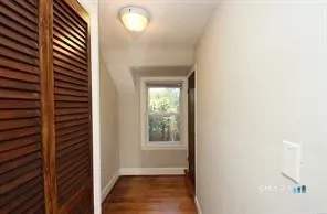 a view of hallway with windows