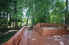 322 Deerfield Road Windsor, CT 06095 - Photo 15 of 15 a view of backyard with deck and outdoor seating