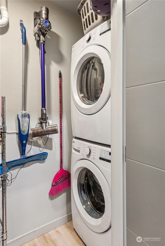 a view of hallway with washer and dryer