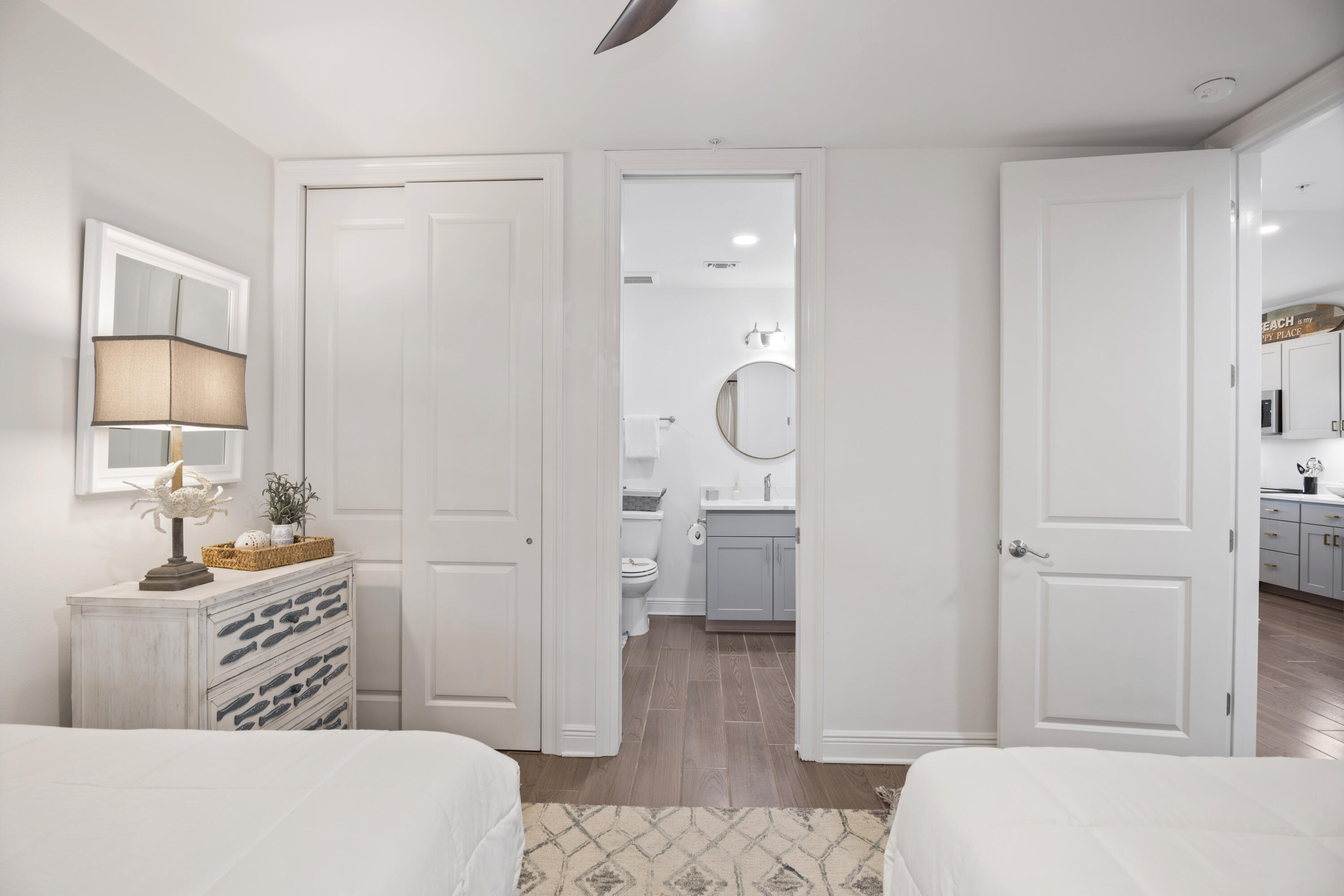 1740 South County Highway, Unit 203 Santa Rosa Beach, FL 32459 - Photo 14 of 40 a bedroom with a bed and a dresser