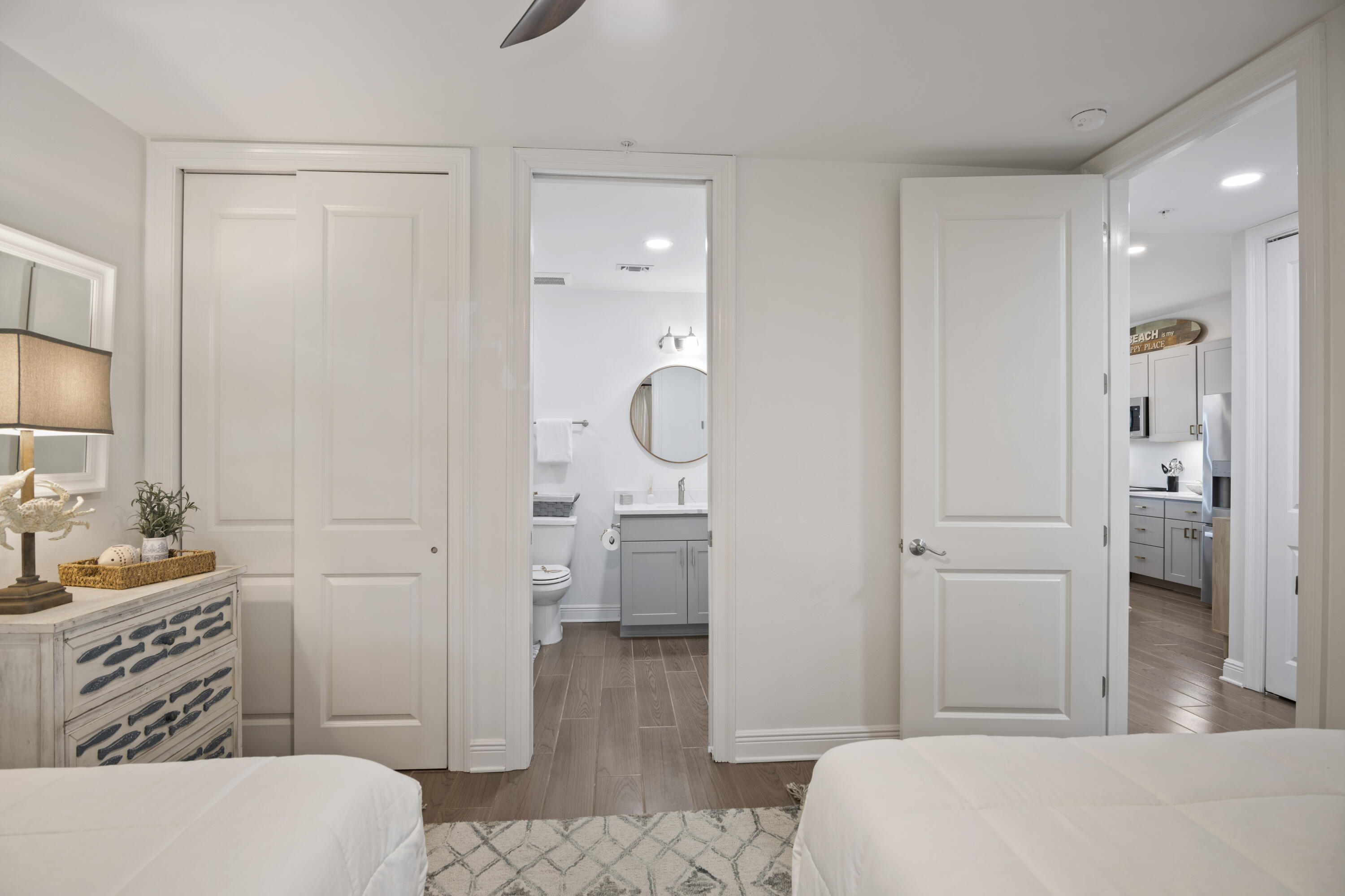 1740 South County Highway, Unit 203 Santa Rosa Beach, FL 32459 - Photo 15 of 40 a bedroom with a bed and a view of bathroom