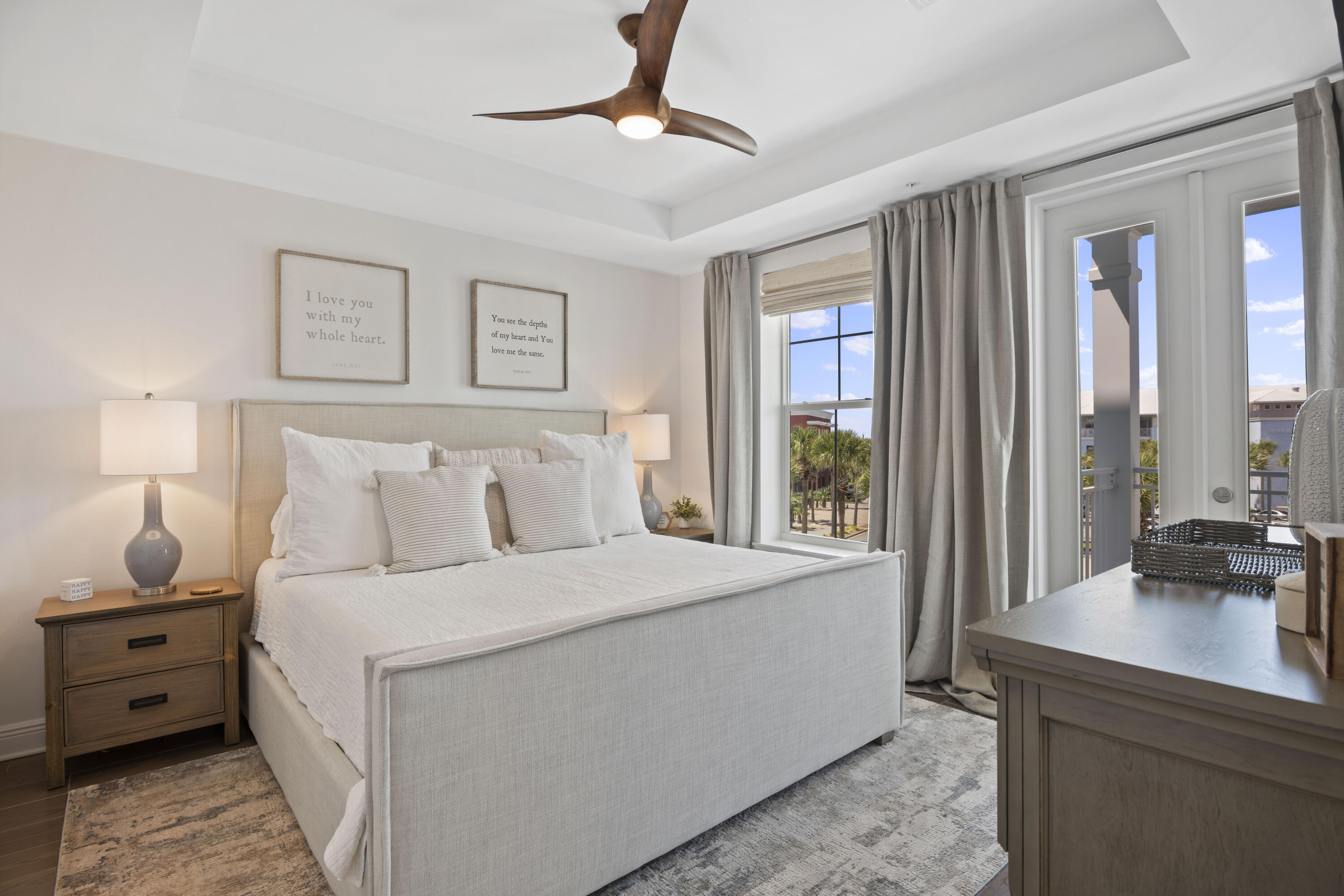 1740 South County Highway, Unit 203 Santa Rosa Beach, FL 32459 - Photo 17 of 40 a bedroom with a large bed and a large window