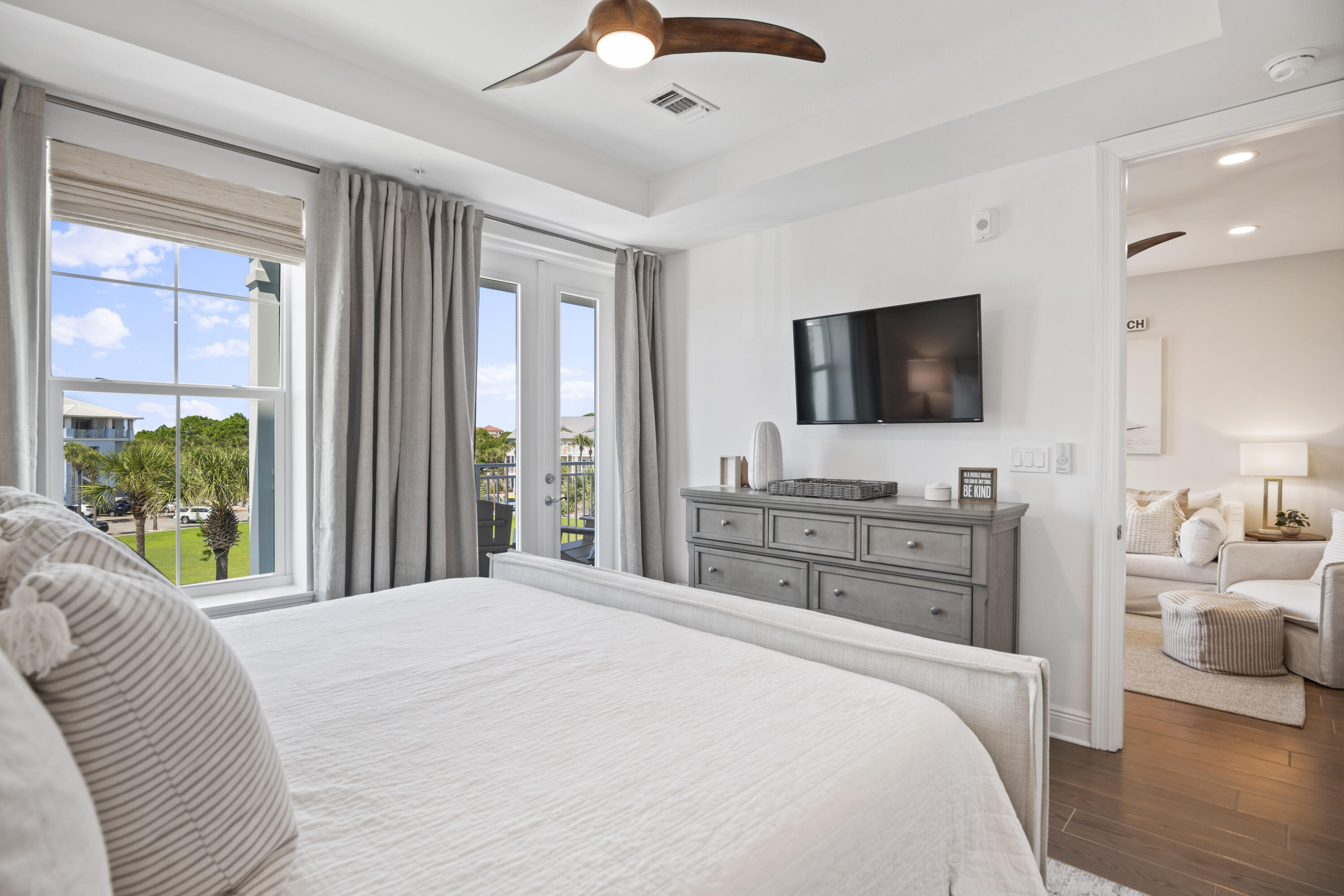 1740 South County Highway, Unit 203 Santa Rosa Beach, FL 32459 - Photo 18 of 40 a bedroom with a bed and a flat screen tv