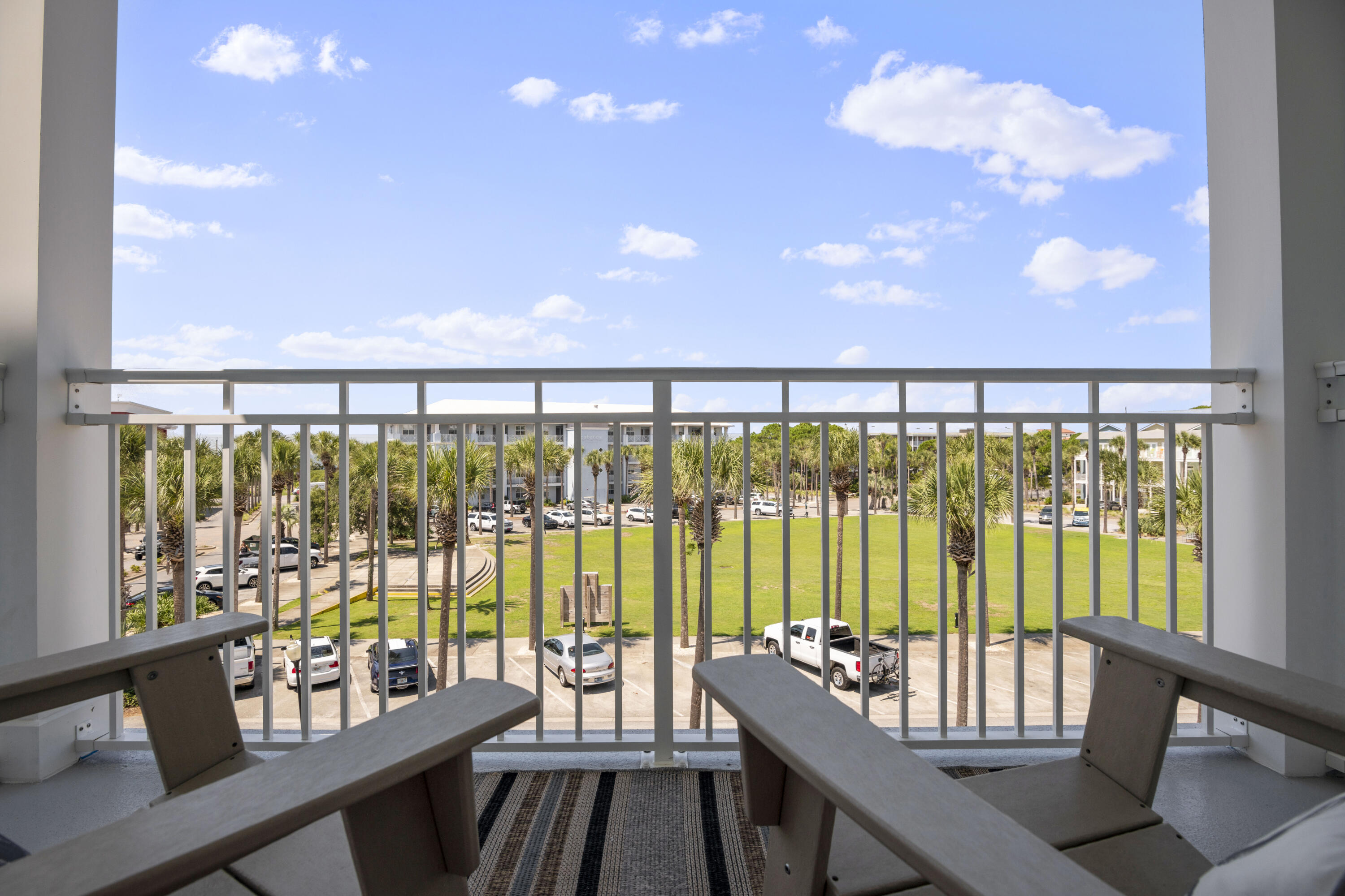 1740 South County Highway, Unit 203 Santa Rosa Beach, FL 32459 - Photo 22 of 40 a balcony with outdoor seating