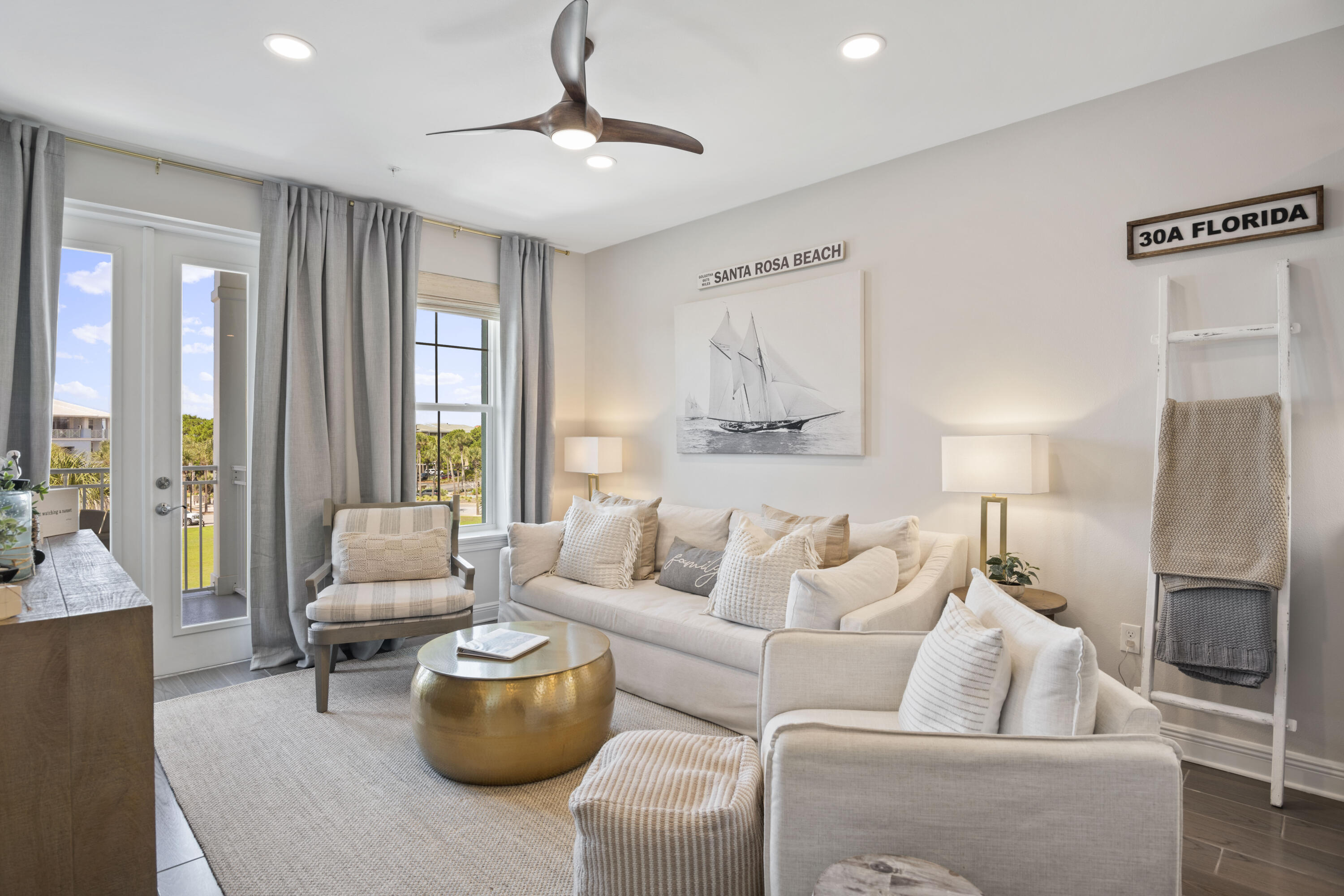 1740 South County Highway, Unit 203 Santa Rosa Beach, FL 32459 - Photo 3 of 40 a living room with furniture and a flat screen tv