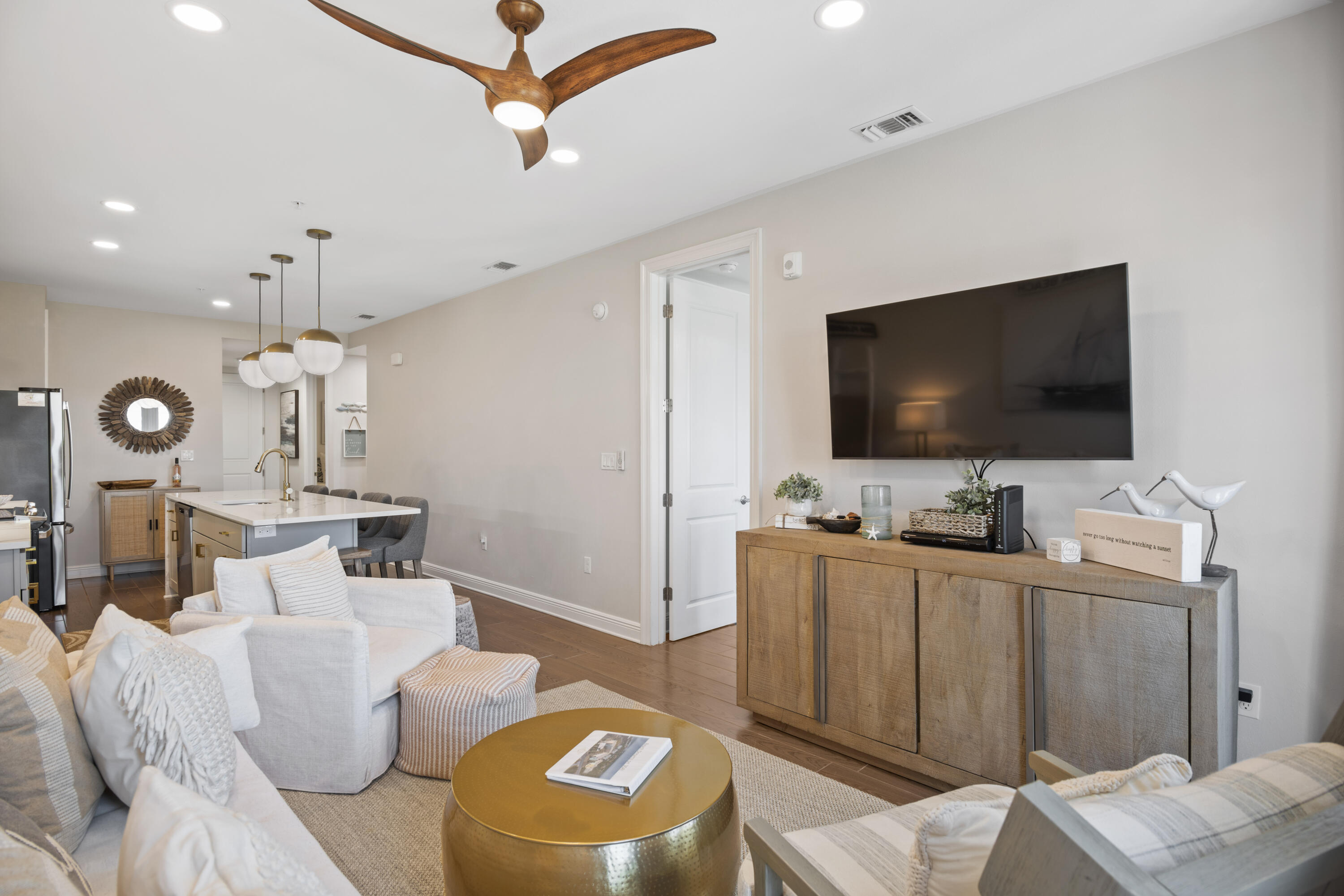 1740 South County Highway, Unit 203 Santa Rosa Beach, FL 32459 - Photo 8 of 40 a living room with furniture and a flat screen tv
