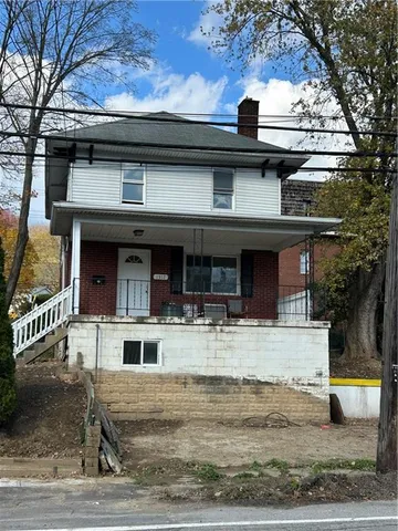 a view of a house with a swimming pool