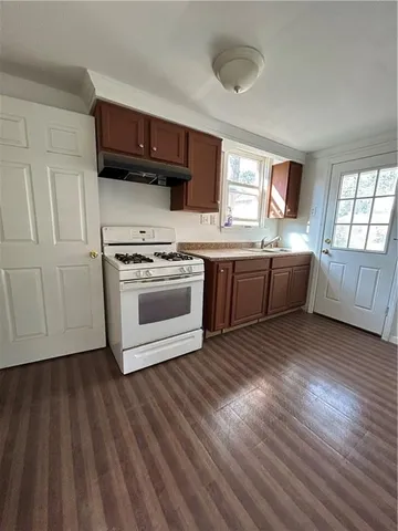 a view of a storage & utility room with empty racks