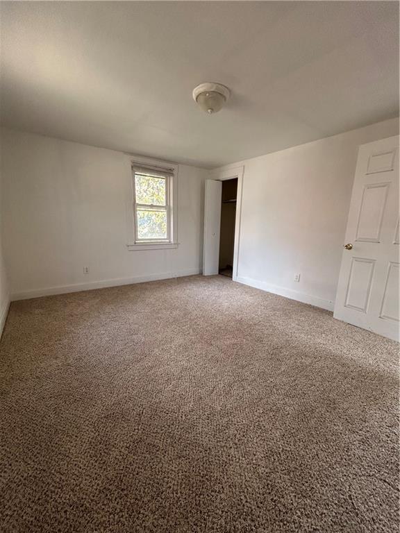 1317 Old Freeport Road Pittsburgh, PA 15238 - Photo 18 of 38 an empty room with windows
