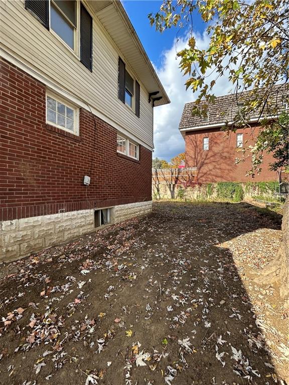 1317 Old Freeport Road Pittsburgh, PA 15238 - Photo 27 of 38 a view of a yard with a tree