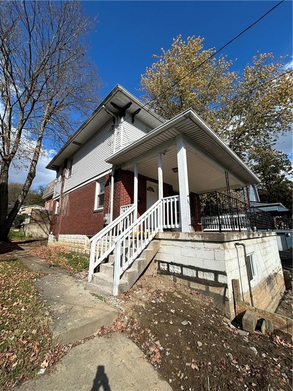 1317 Old Freeport Road Pittsburgh, PA 15238 - Photo 4 of 49 a front view of a house with a yard