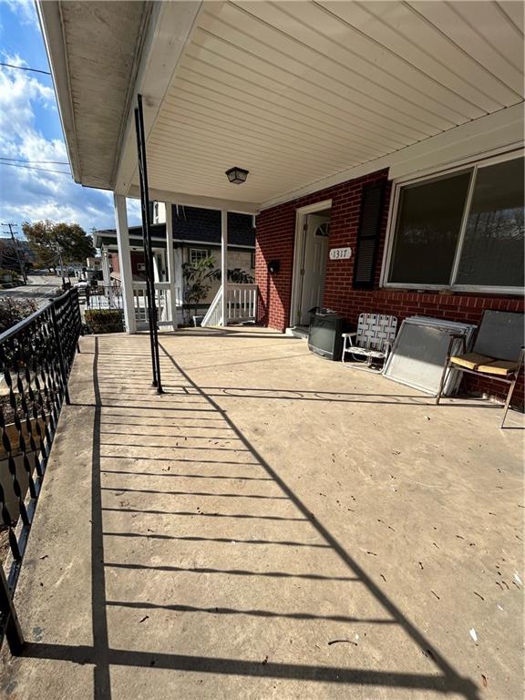 1317 Old Freeport Road Pittsburgh, PA 15238 - Photo 5 of 38 a view of a patio with table and chairs with wooden floor and fence