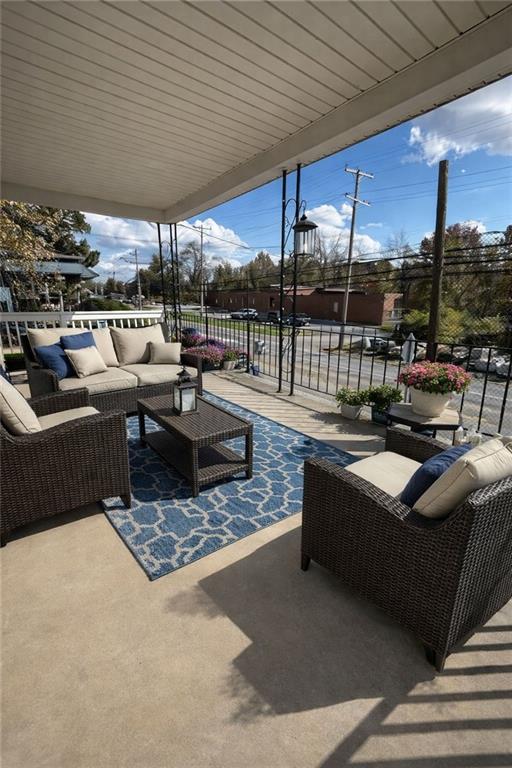 1317 Old Freeport Road Pittsburgh, PA 15238 - Photo 5 of 49 a outdoor living space with patio furniture and a potted plant