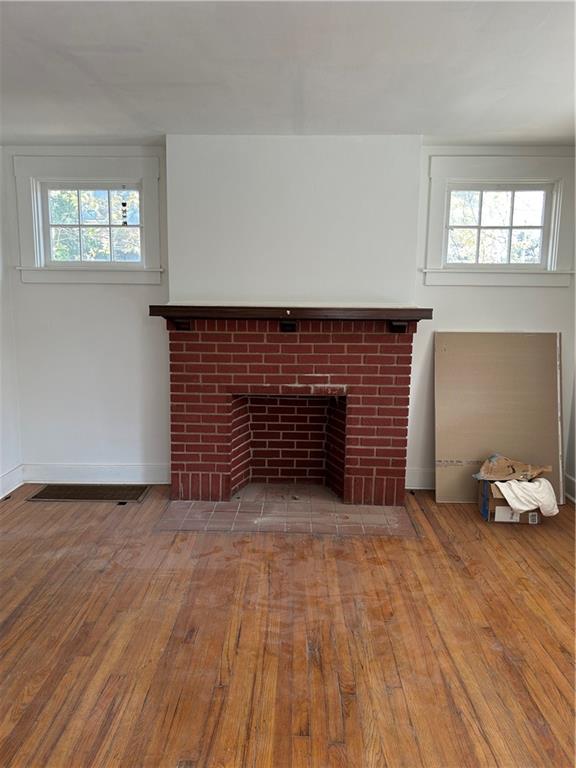 1317 Old Freeport Road Pittsburgh, PA 15238 - Photo 10 of 49 a view of an empty room with wooden floor and a window