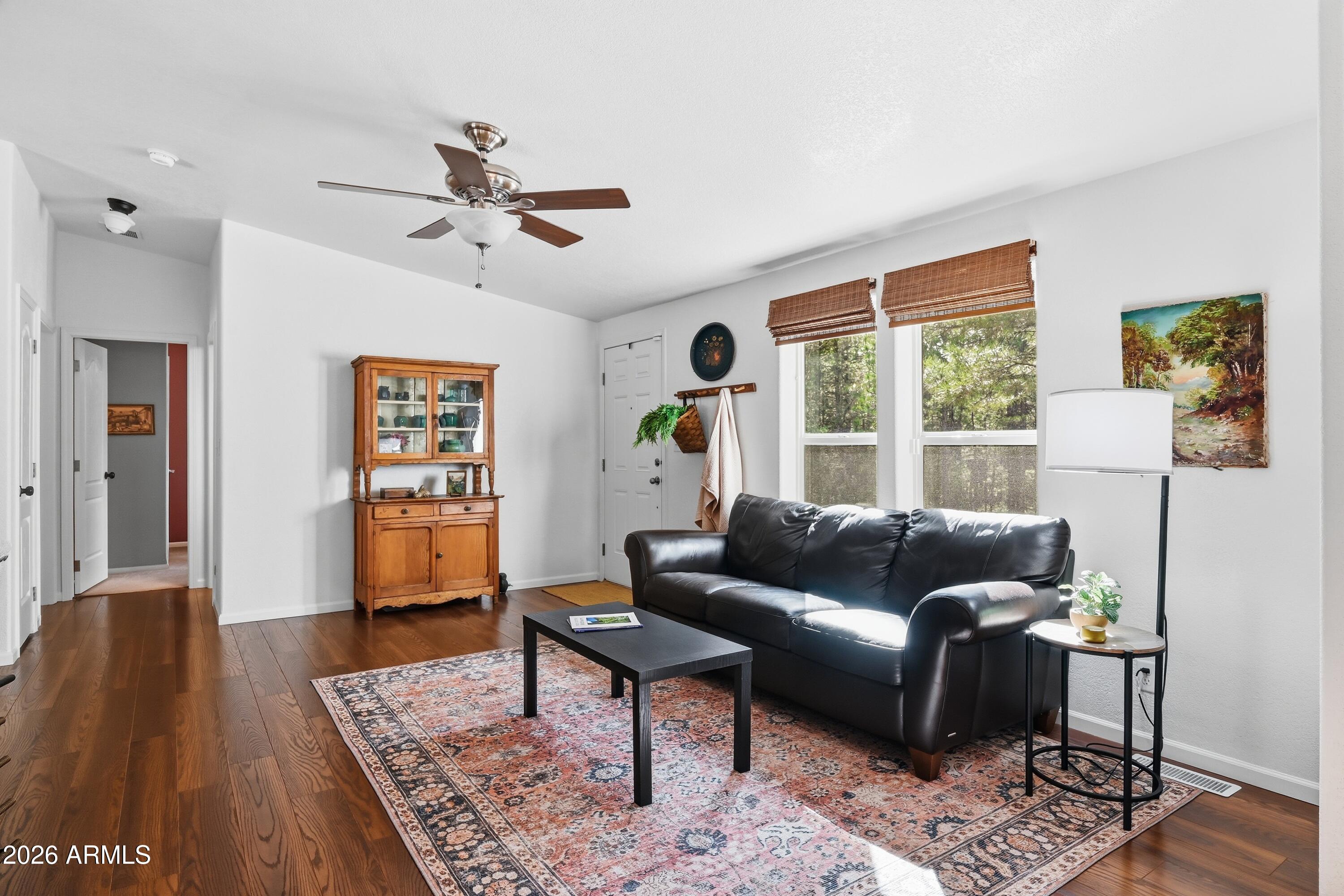 2381 Blue Ridge Drive Happy Jack, AZ 86024 - Photo 8 of 45 a living room with furniture and a window