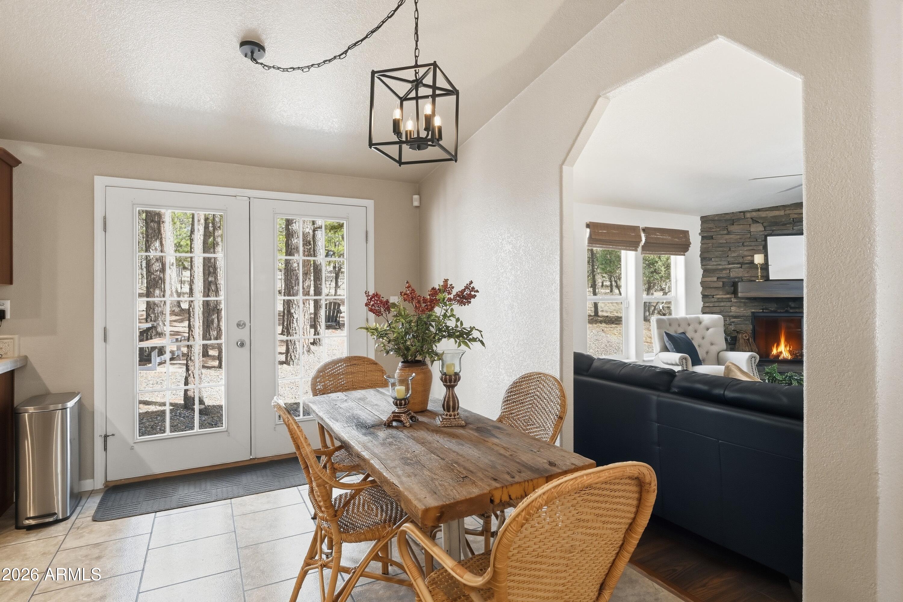 2381 Blue Ridge Drive Happy Jack, AZ 86024 - Photo 11 of 45 a view of a dining room with furniture window and outside view