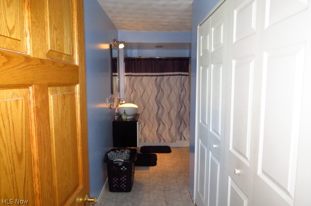 8919 Cherry Road Vermilion, OH 44089 - Photo 12 of 24 Entrance to Master Bath with Loads of Closet Space