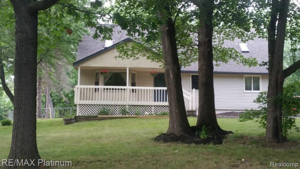 604 Fisher Road Highland, MI 48357 - Photo 1 of 15 20140706_173803 (1).jpg