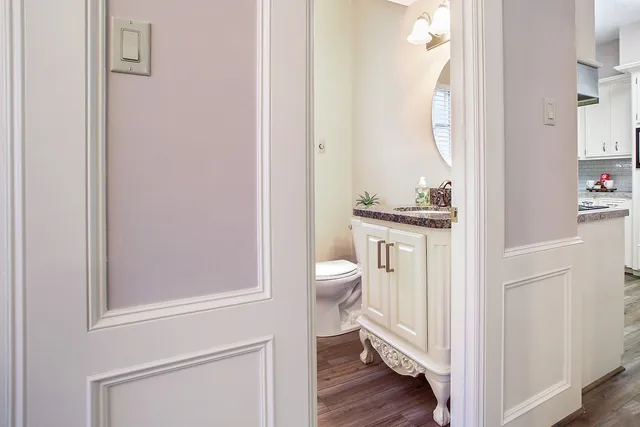 a view of a bathroom from a hallway