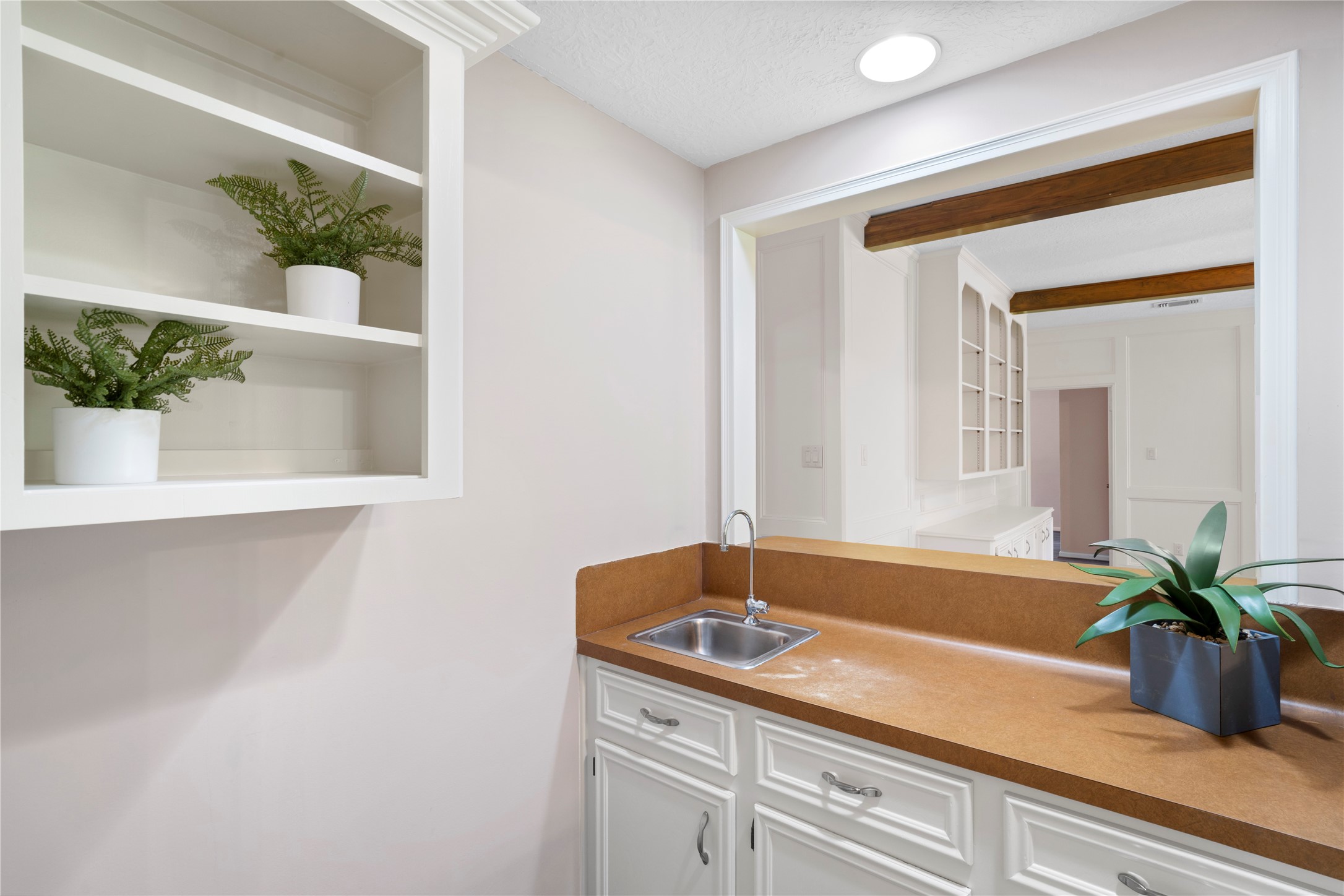 5402 Summerfield Lane Spring, TX 77379 - Photo 15 of 32 a bathroom with a granite countertop sink a large mirror and a potted plant