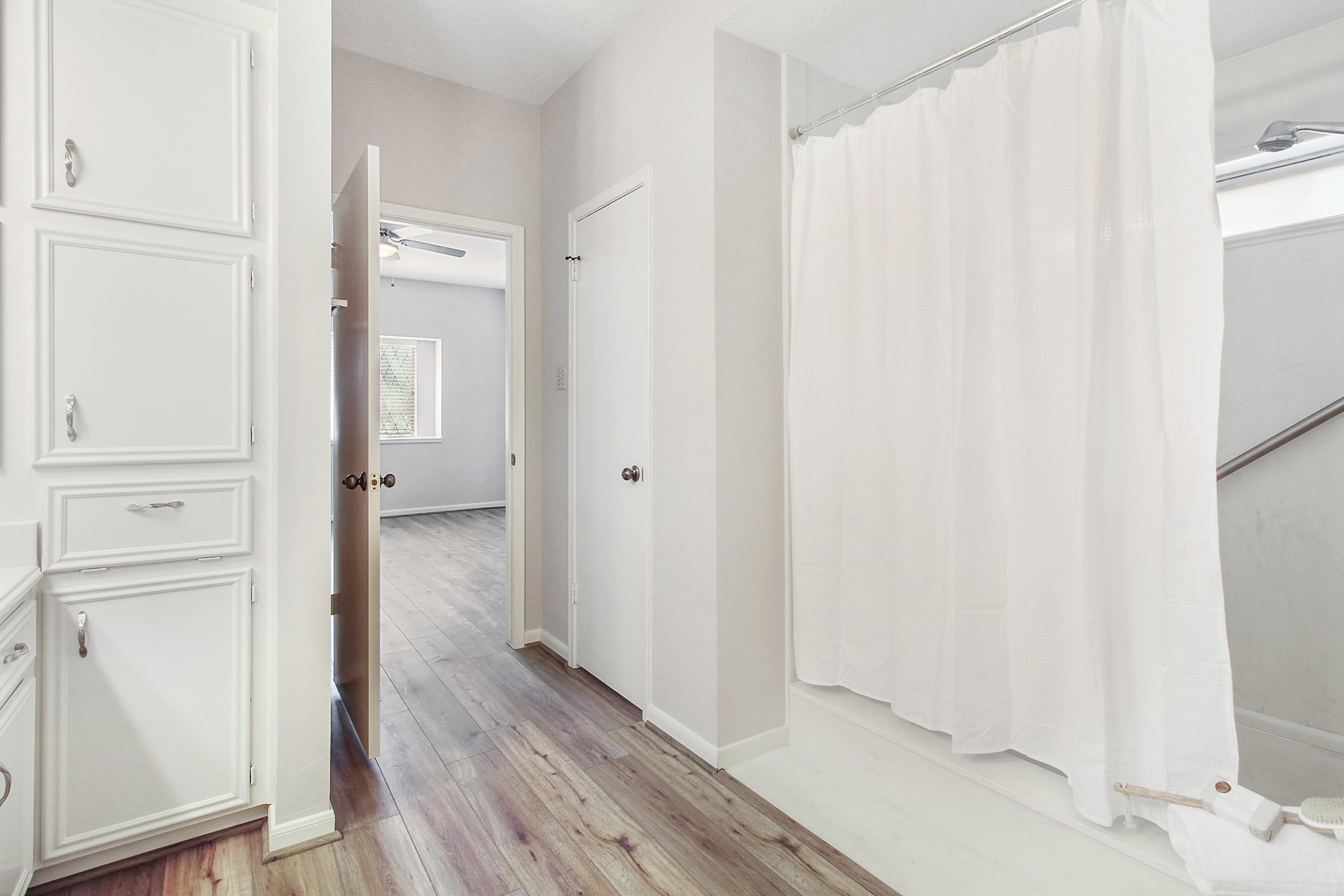 5402 Summerfield Lane Spring, TX 77379 - Photo 19 of 32 a view of a bathroom from a hallway
