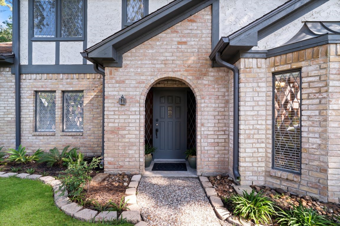 5402 Summerfield Lane Spring, TX 77379 - Photo 2 of 32 a front view of a house with garden