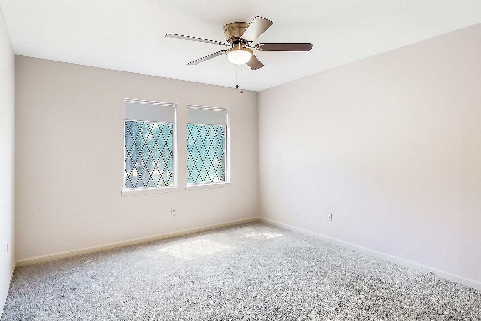 5402 Summerfield Lane Spring, TX 77379 - Photo 23 of 32 an empty room with a window and a fan