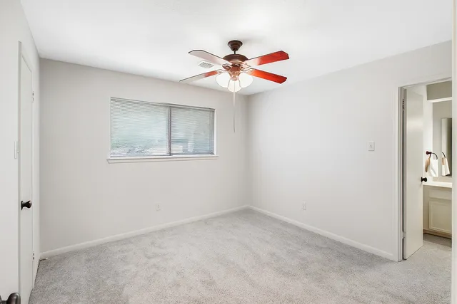 a bathroom with a sink vanity and a mirror