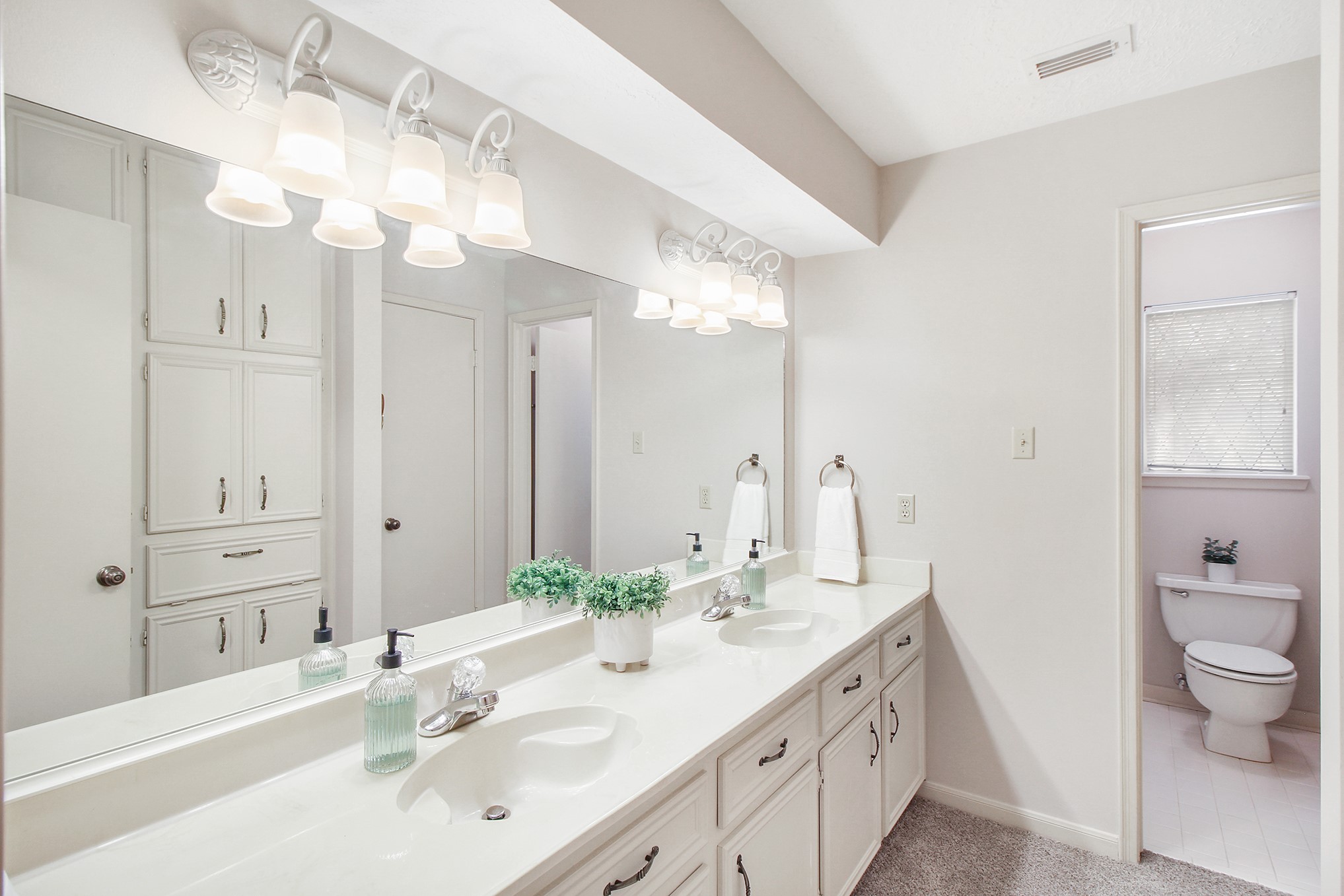 5402 Summerfield Lane Spring, TX 77379 - Photo 25 of 32 a bathroom with a sink vanity and a mirror
