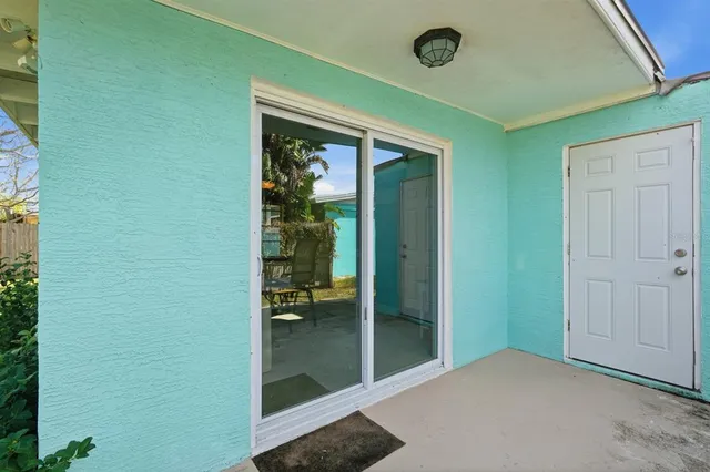 a view of a chairs and table in the garden