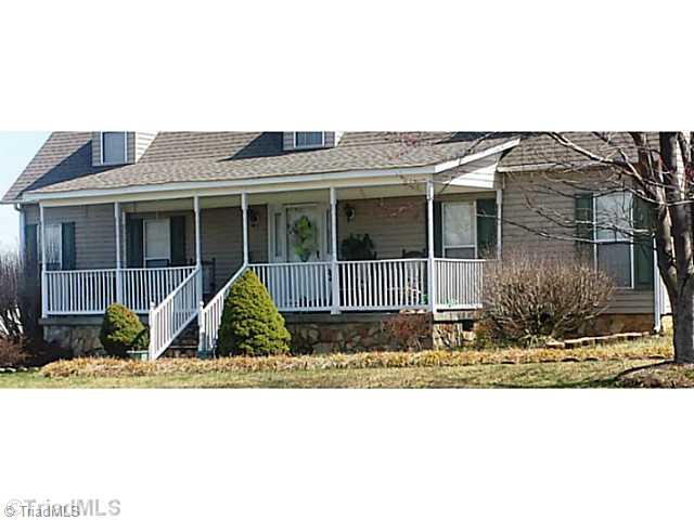 1979 Oregon Hill Road Ruffin, NC 27326 - Photo 2 of 21 Exterior Front. Great Rocking Chair front porch