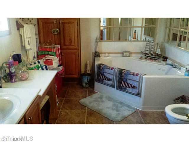1979 Oregon Hill Road Ruffin, NC 27326 - Photo 12 of 21 Master Bath/Spa. Master Bath has large tub plus a walk-in shower.