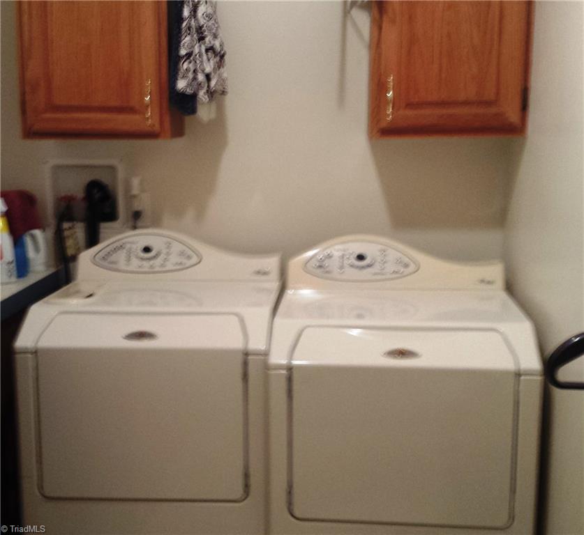 1979 Oregon Hill Road Ruffin, NC 27326 - Photo 17 of 21 First floor laundry room with cabinets