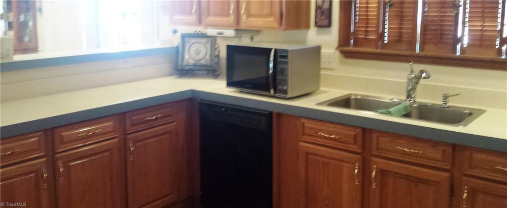 1979 Oregon Hill Road Ruffin, NC 27326 - Photo 8 of 21 Kitchen has beautiful cabinets and plenty of counter space!