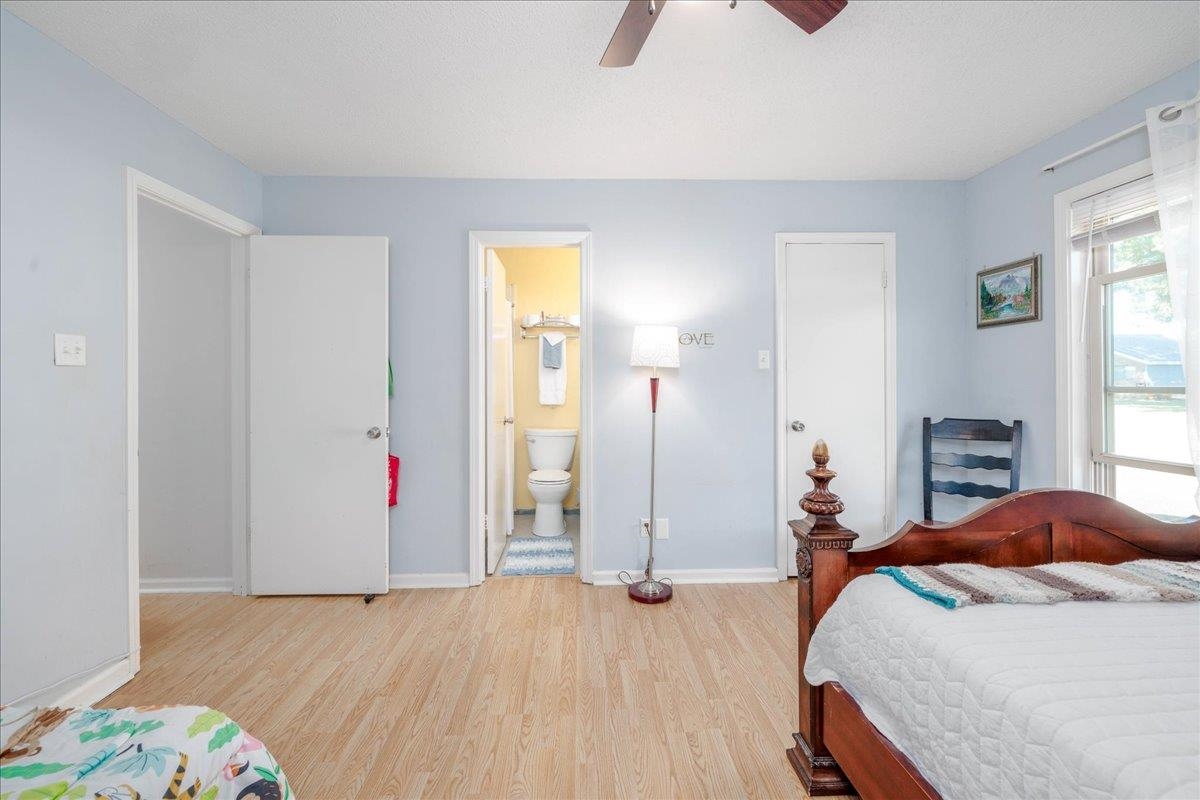 4357 Water Briar Road Millington, TN 38053 - Photo 20 of 29 Bedroom with ceiling fan, light hardwood / wood-style floors, and ensuite bathroom