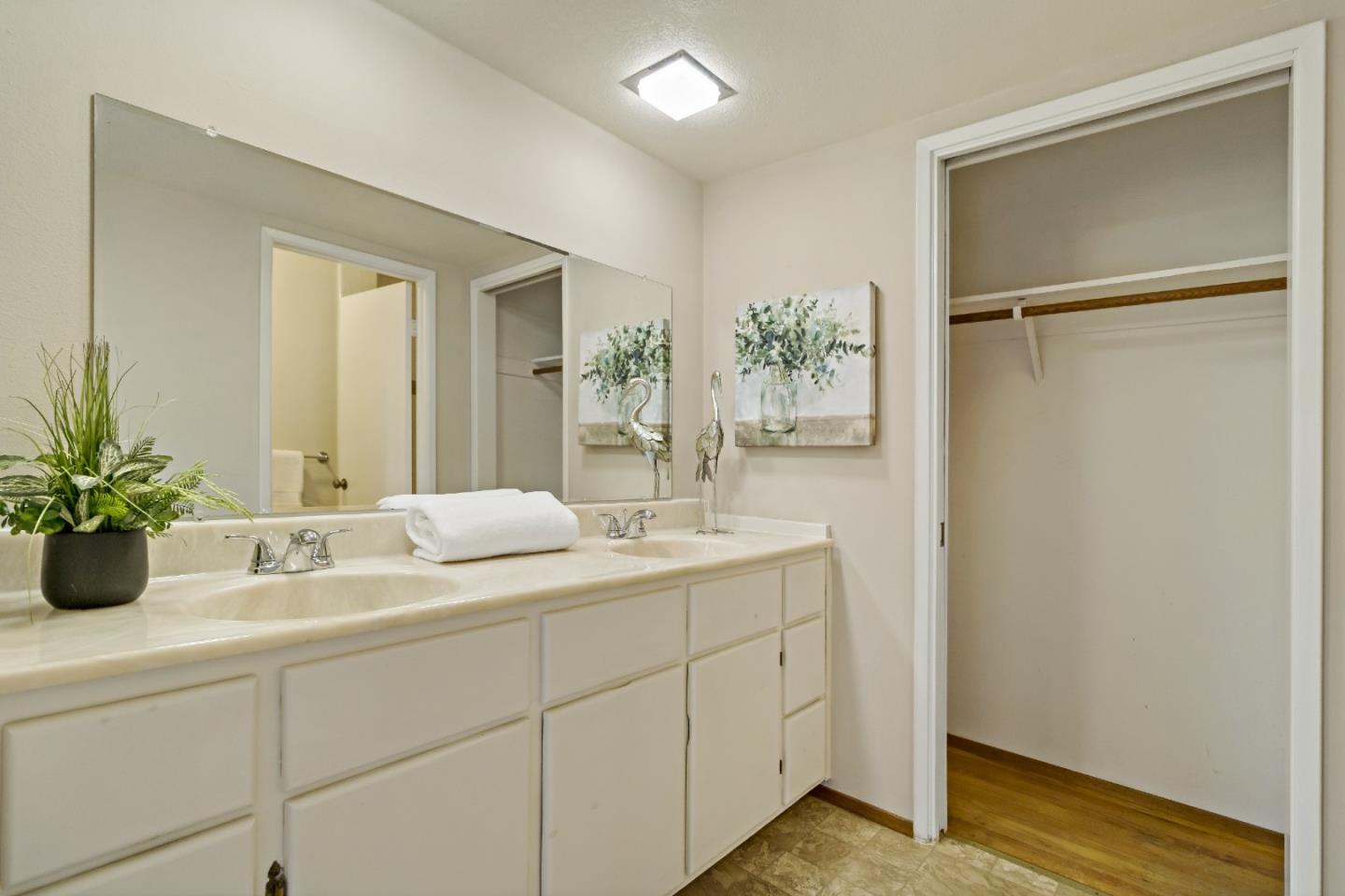 1287 Peralta Drive San Jose, CA 95120 - Photo 30 of 38 a bathroom with a granite countertop sink and a mirror