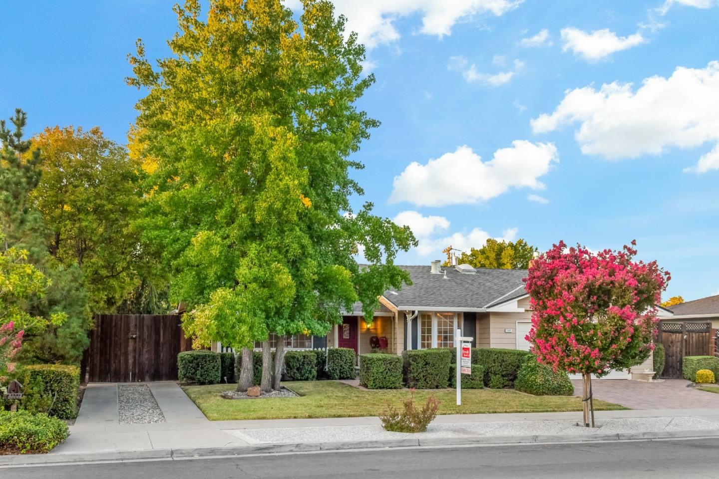 1287 Peralta Drive San Jose, CA 95120 - Photo 3 of 38 a front view of a house with a yard