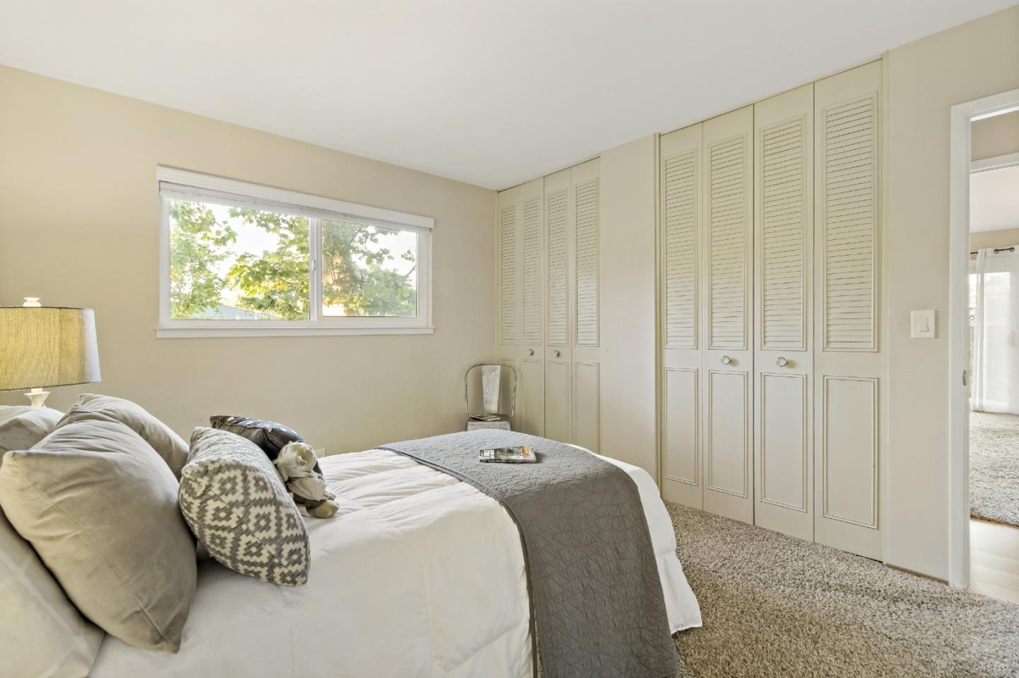 1287 Peralta Drive San Jose, CA 95120 - Photo 33 of 38 a bedroom with a bed and a window